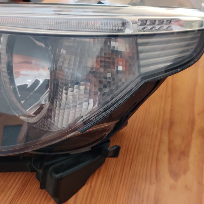 Ótica/Farol esquerdo BMW (E61)