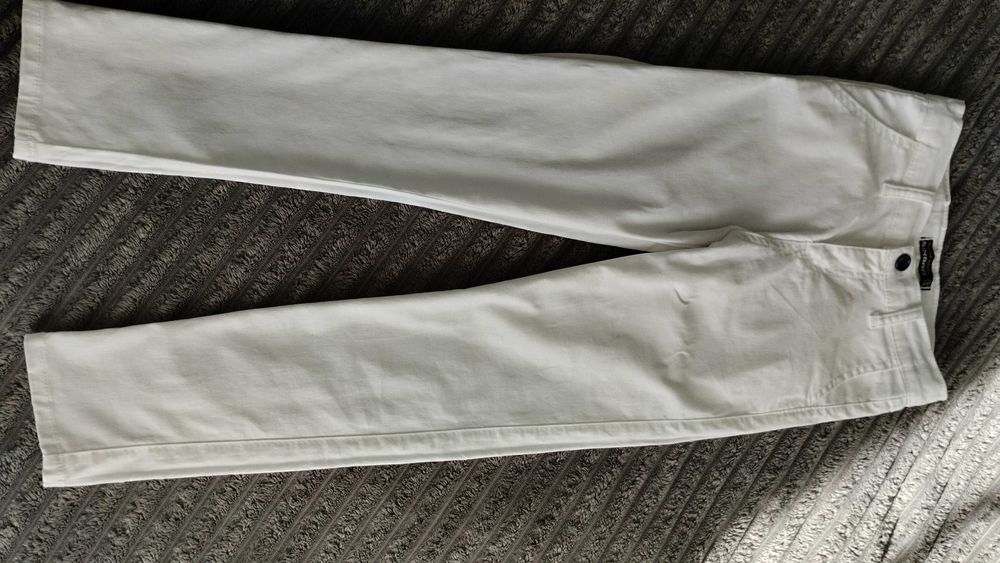 Білі штани на хлопчика 9-10 років