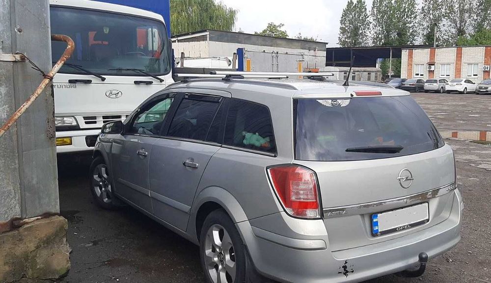 Алюминевые Аэродуги R9 - LX на рейлинги OPEL ASTRA H CARAVAN