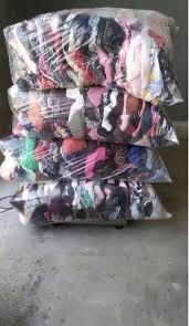 Одяг на вагу мішками та пакетом в необмеженій кількість