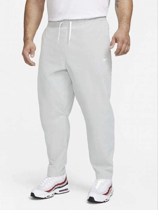 Штани чоловічі Nike club woven tapered leg pants grey