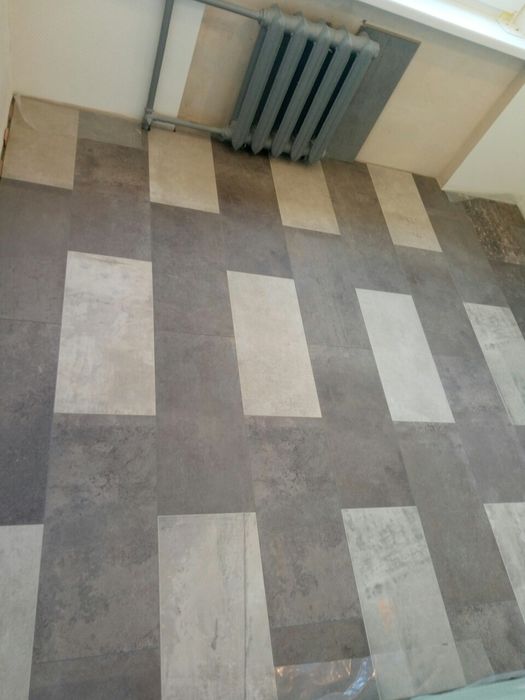 Укладка ламінату, паркетної дошки, вінілового покриття