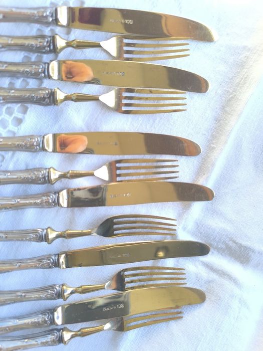 12 Talheres de sobremesa Solingen com cabo em prata