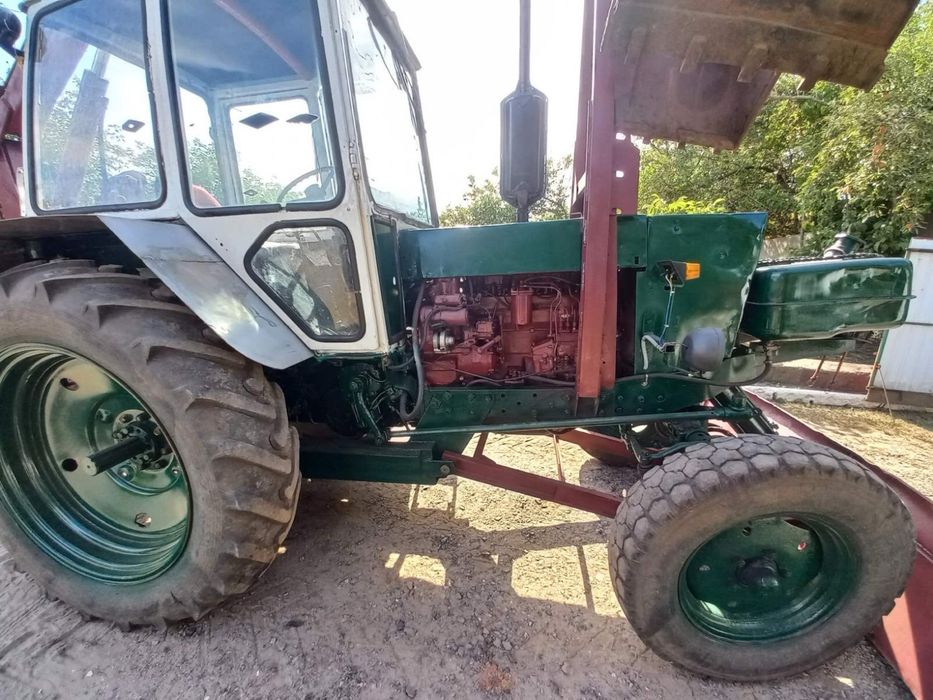 Грейферний погрузчик юмз