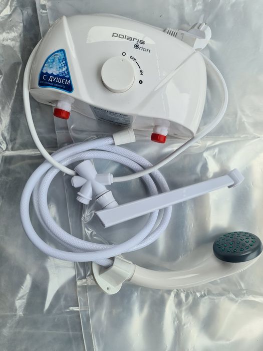 Водонагреватель проточный.