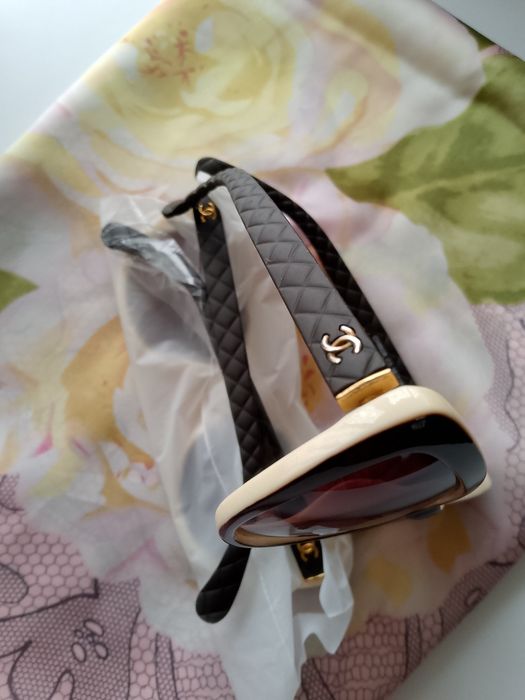Сонцезахиахисні окуляри Chanel i Versace