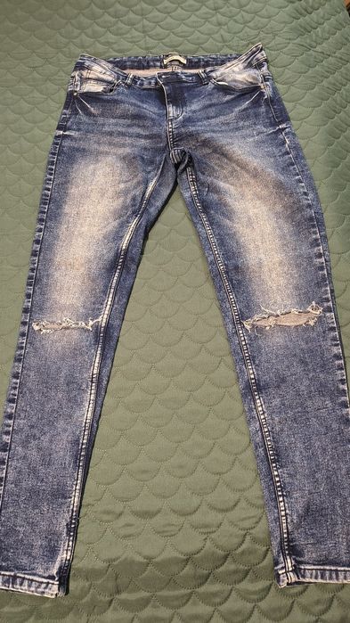 Spodnie damskie jeansy Cropp rozmiar L