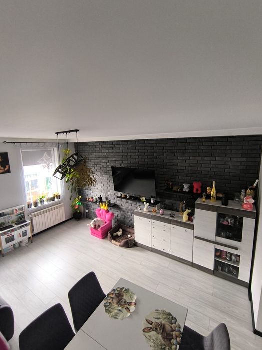 Dwa mieszkania, Duży garaż