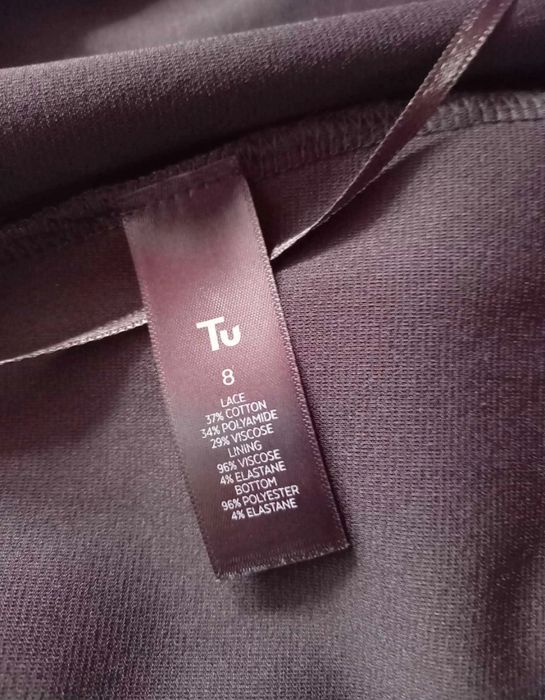 Elegancki czarny kombinezon 36