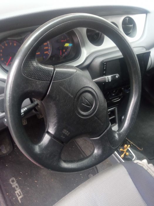 Автомобиль Дайхатсу.  Малолитражка. 2000 год выпуска