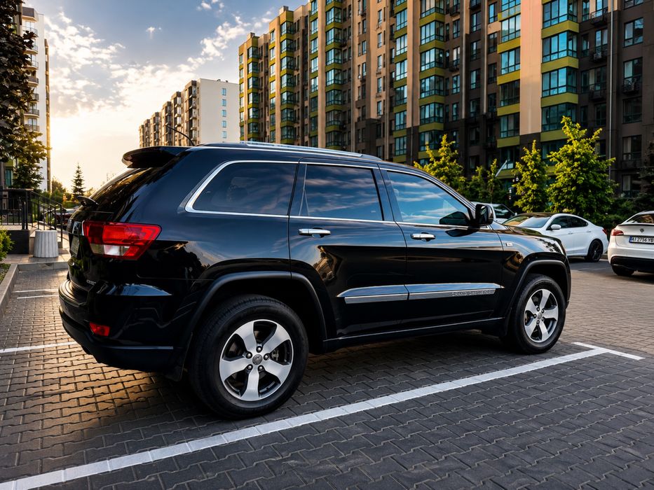 Jeep Grand Cherokee 2012 VIN 1C4RJFCM9CC228233 фото оголошення 4 з 24