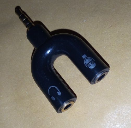 Аудіоадаптер 3.5 мм для навушників і мікрофона

Аудіоадаптер 2-в-1 з р