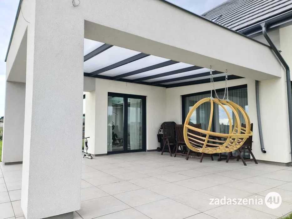 Zadaszenia tarasów zadaszenie tarasu pergole aluminiowe ogrody zimowe zabudowy szklane zabudowy tarasów systemy przesuwne szkło aluminium WR