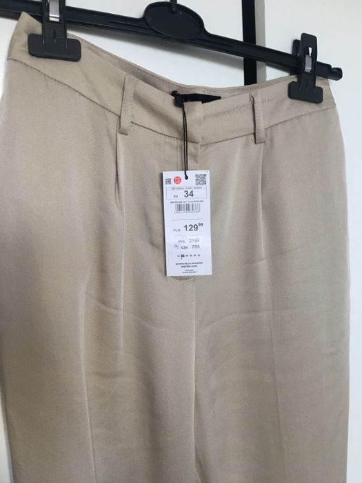 nowe spodnie z wysokim stanem Mohito XS