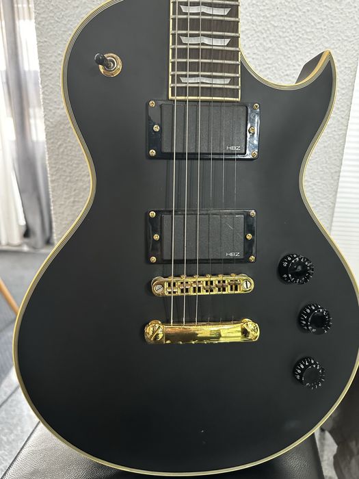 Conjunto amplificador e guitarra elétrica