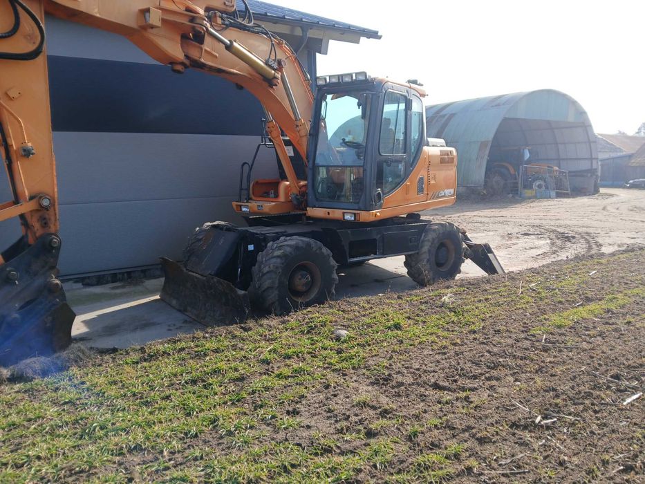 koparka kołowa doosan develon cat  pług ramie szybka