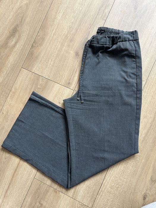 Ciemnoszare eleganckie spodnie na gumce Mango szare luźne szerokie