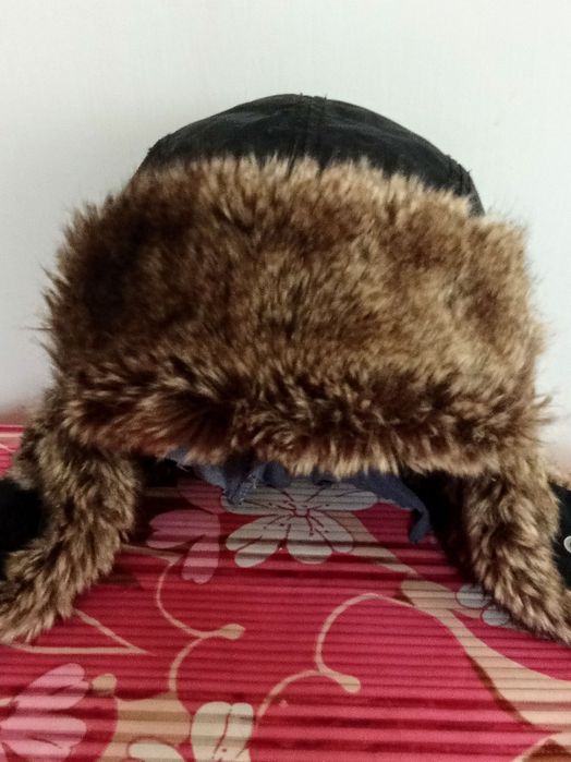 Новая  теплая шапка фирмы Н and M  57размер