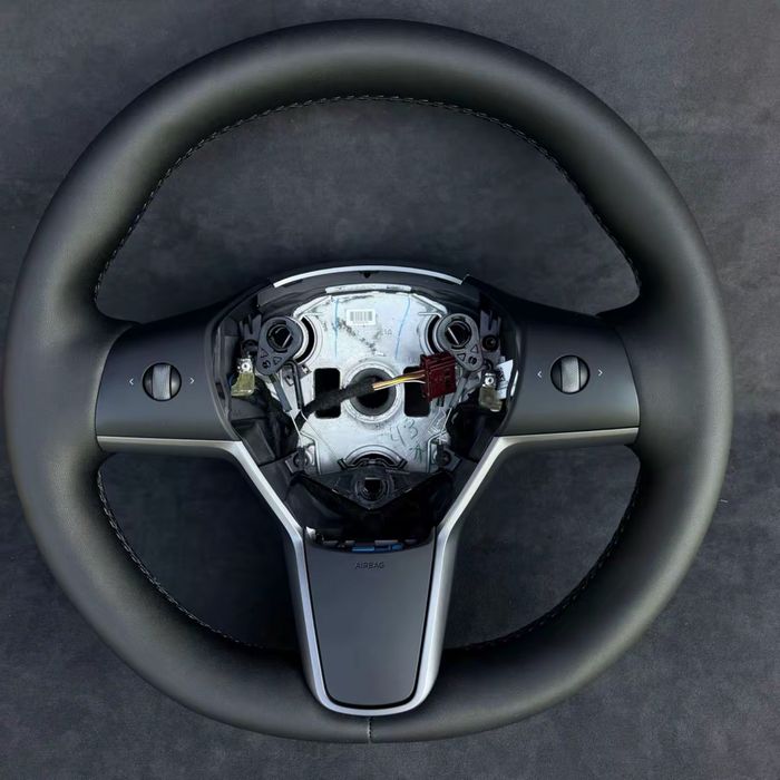Перетяжка керма Tesla Model  Y Model 3 перешивка руля