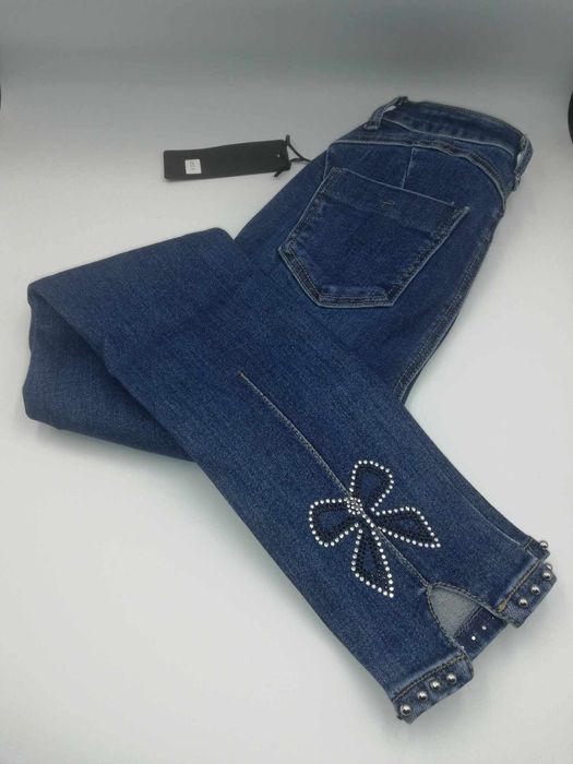 Super elastyczne Spodnie jeans z kokarda 34