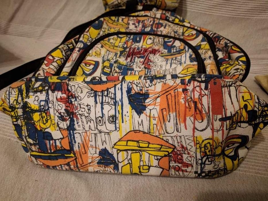 Mochila de costas maui com divisões  como nova