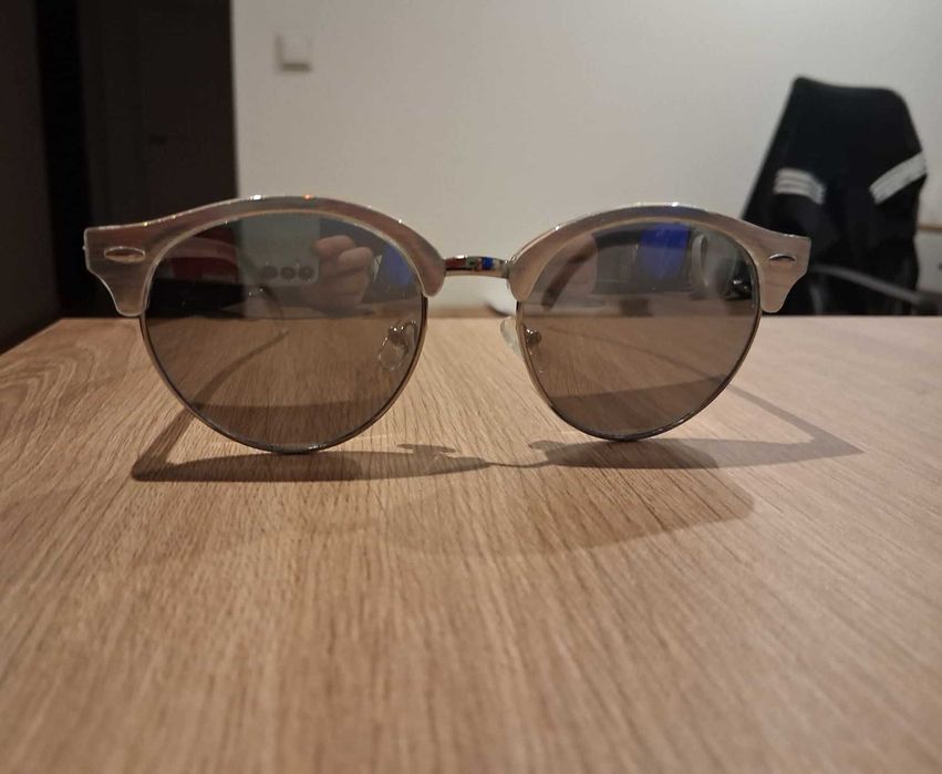 Okrągłe okulary przeciwsłoneczne transparentne oprawki