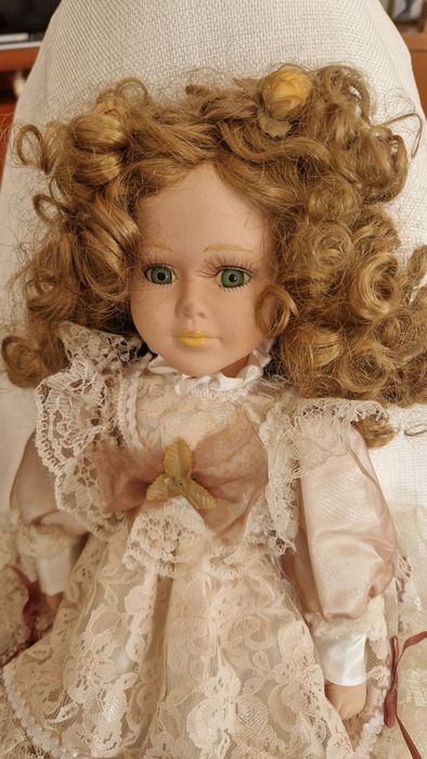 Bonecas em porcelana
