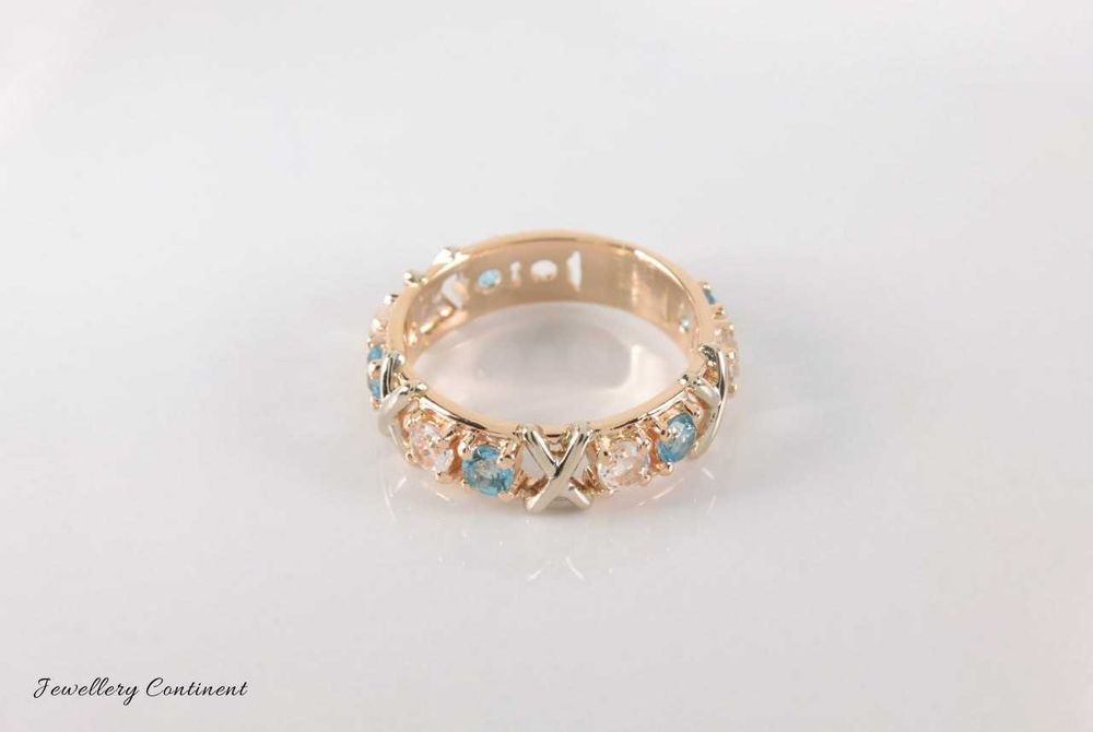 Кольцо из золота с топазами