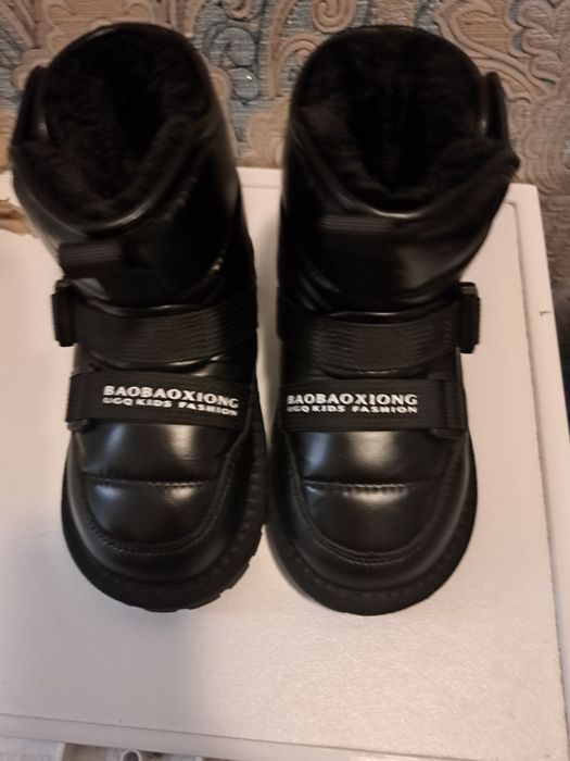 Чоботи  зимові .