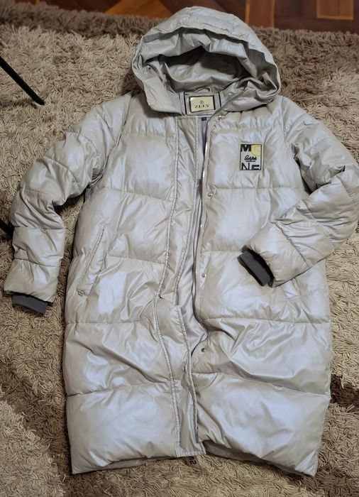 Пуховик зима жіночій