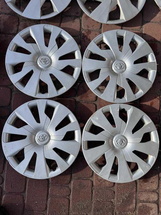 '15 Kołpaki komplet oryginalne Toyota Yaris Auris Aygo Avensis Proace