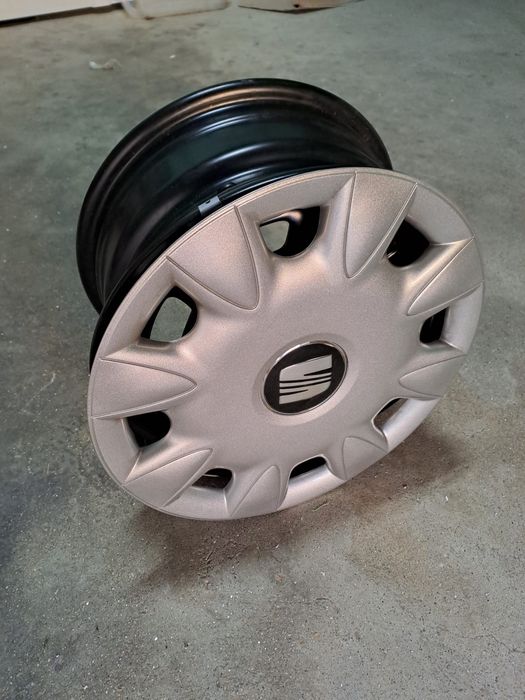 4 Jantes de aço de 14’’ com tampões SEAT