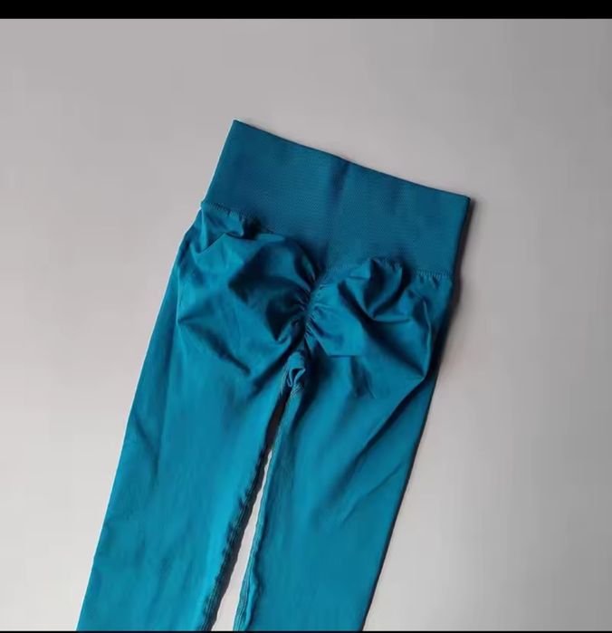 Бірюзові лосіни, розмір с,нові, плотні