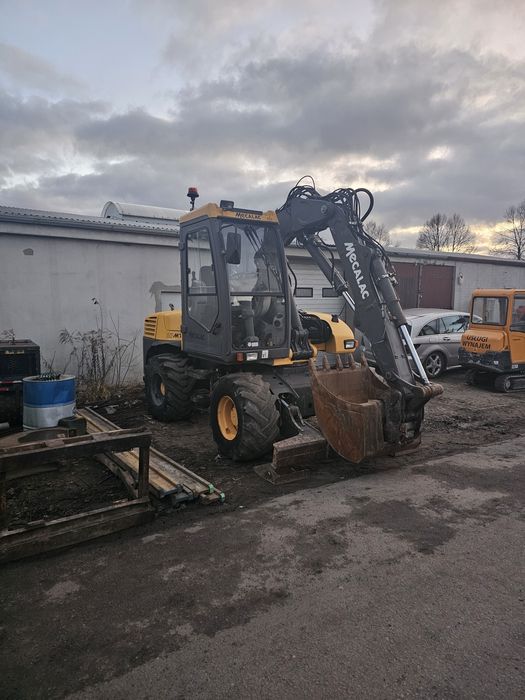 Usługi koparka mecalac 12