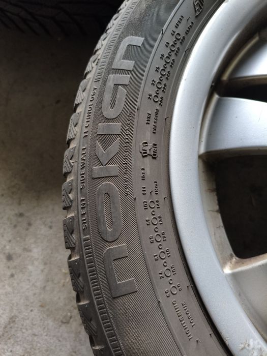 Felgi BMW styling 154 opony zimowe Nokian 16"