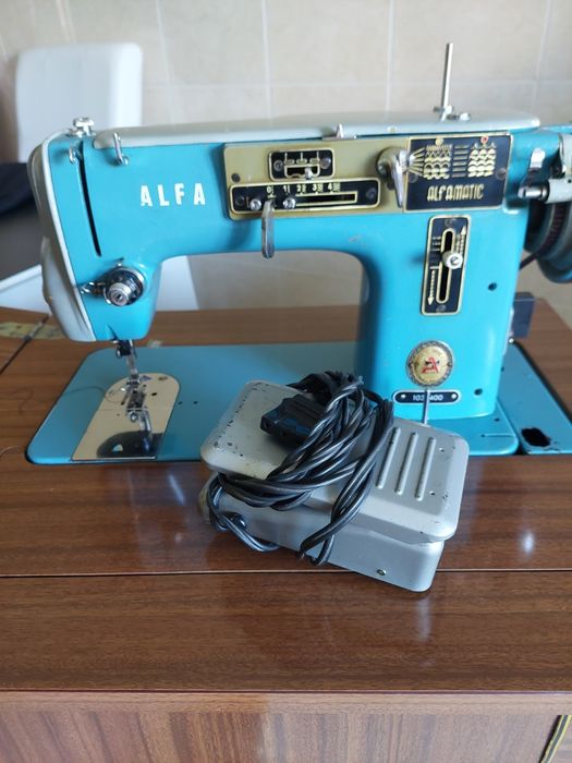 Máquina costura elétrica