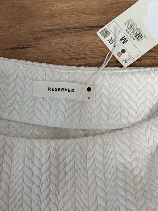 Спідниця білого кольору