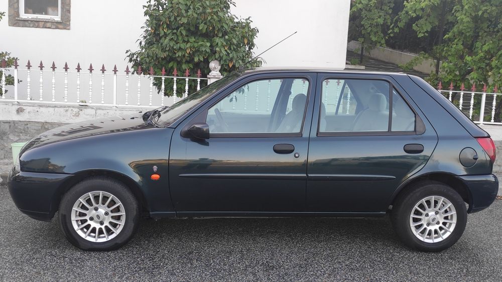 Ford Fiesta 1.25 Ghia — photo 2
