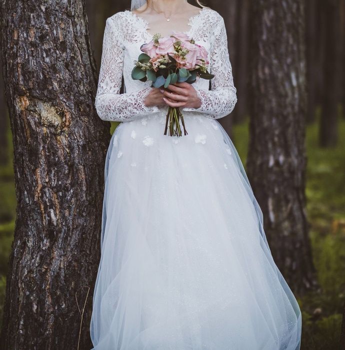 Suknia ślubna szyta z projektu przez salon Scarlett