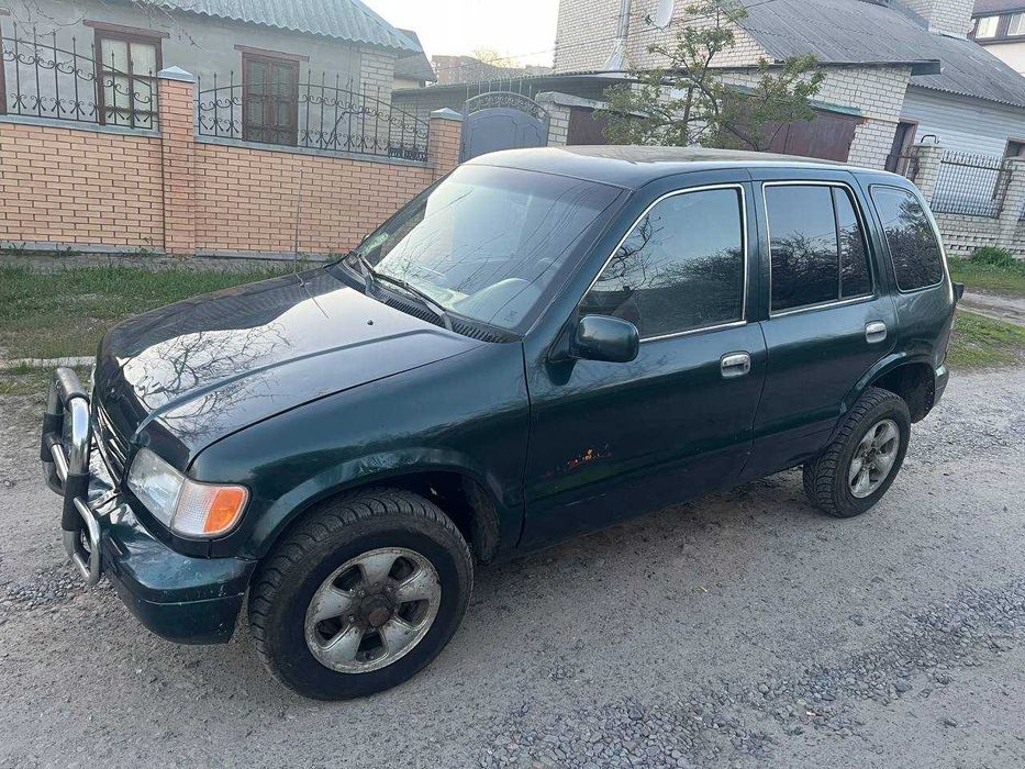 Продам КIA Спортедж 1996 року на повному ходу.до ноября по техпаспорту 2700дол