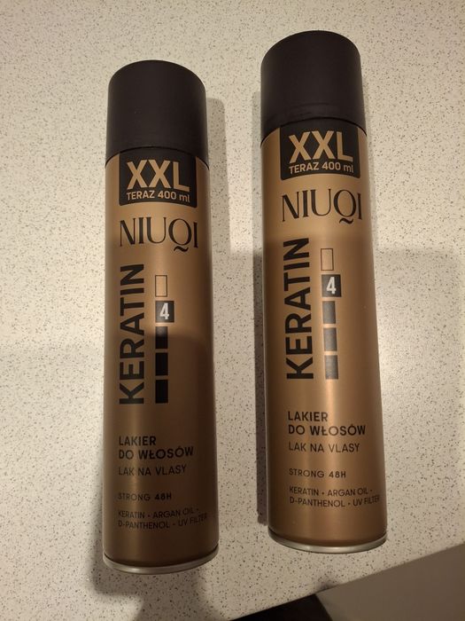 Dwa opakowania lakierów do włosów