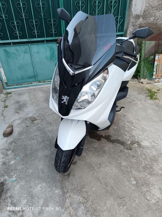 Pegeot satelis 125