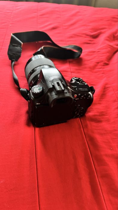 Maquina fotografica sony sl 65 com lente