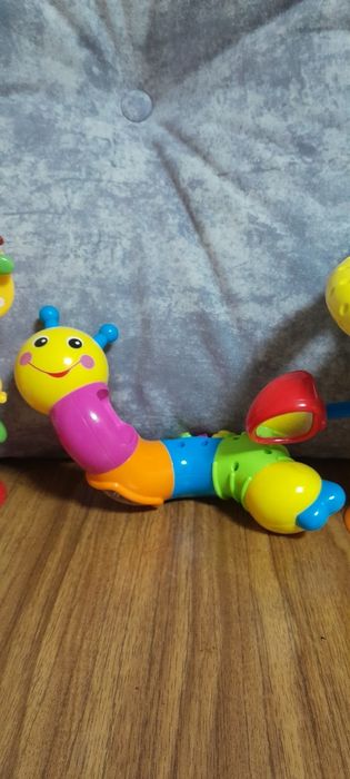 Іграшки розвиваючі інтерактивні кермо гармошка квітка мікрофон Vtech