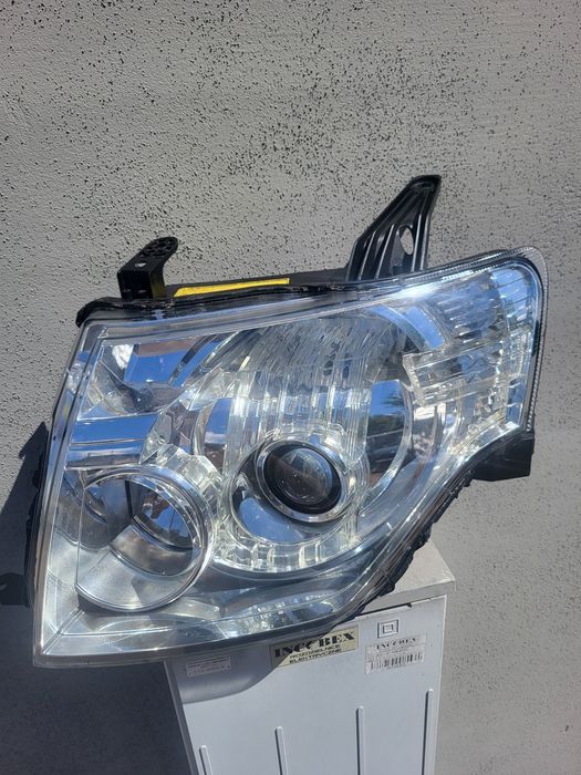 Reflektor lewy xenon Mitsubishi Pajero IV 4 o