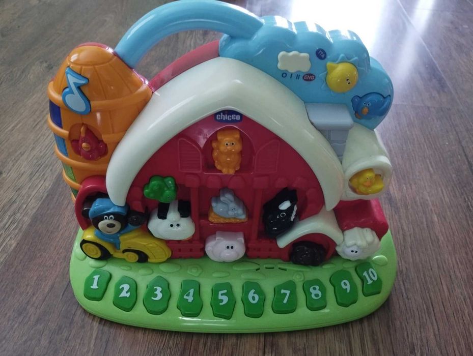 Розвиваюча музикальна іграшка ферма Chicco