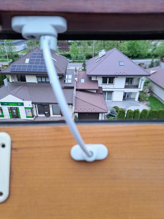 Blokada okna przed dziećmi Penkid biła