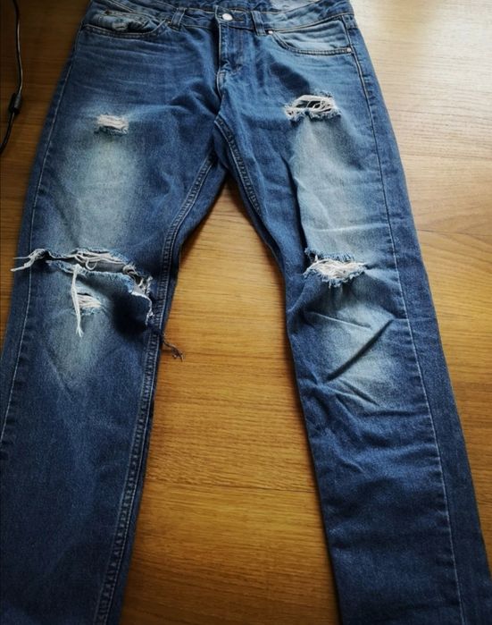 Heidi Klum markowe spodnie damskie jeans z przetarciami Modne 40 L
