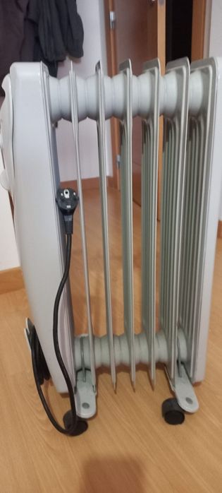Vendo aquecedor a óleo 9
