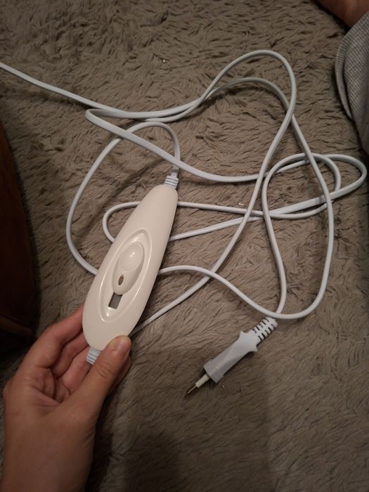 Elektryczny ogrzewacz do stóp but